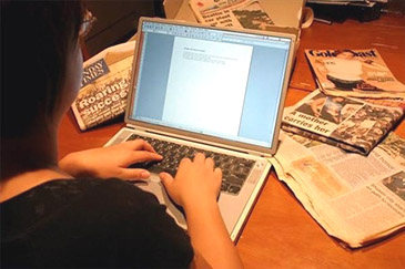Writing on laptop